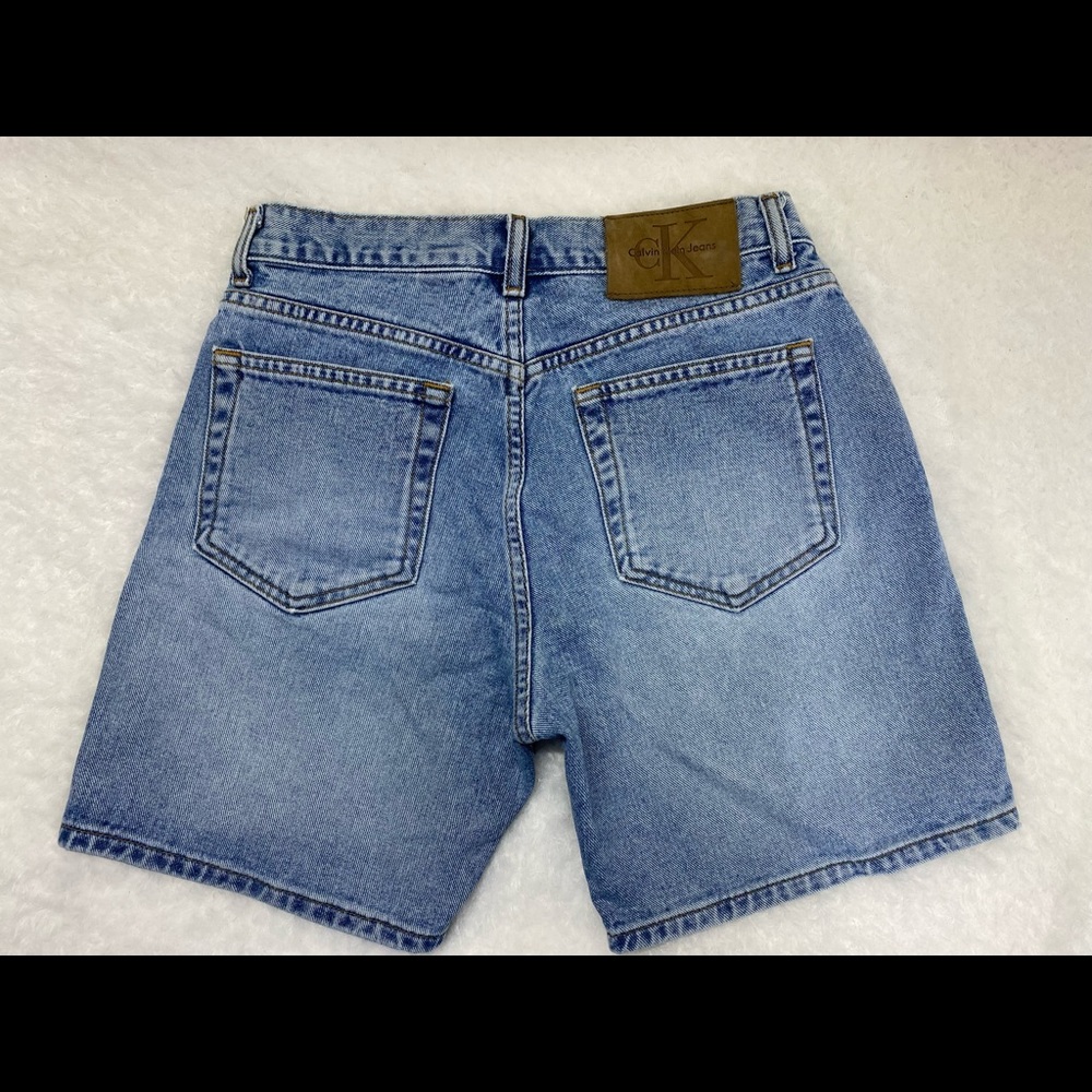 Calvin Klein blue jean shorts, size 9, 5 button closure, EUC